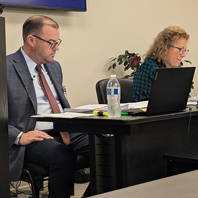 Michael Robinson reviewing notes during Virginia CLE seminar